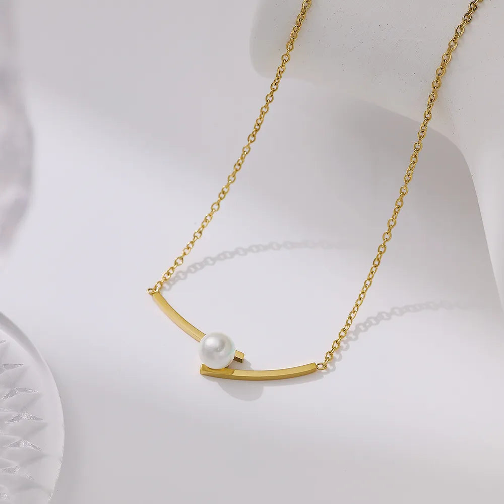 Layered gold necklace set with freshwater pearl pendant — The Pearl Stack by MAEVA